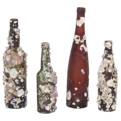 Set of Four Barnacle Encrusted Vintage Bottles, Priced Individually