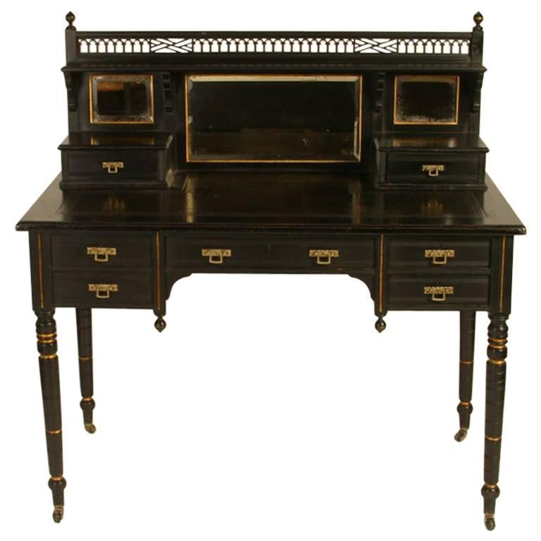 Ebonized and Parcel Gilt Aesthetic Movement desk by Maple and Co