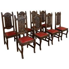 Set of Eight Antique Hand-Carved Renaissance Dining Chairs with Leather Seats