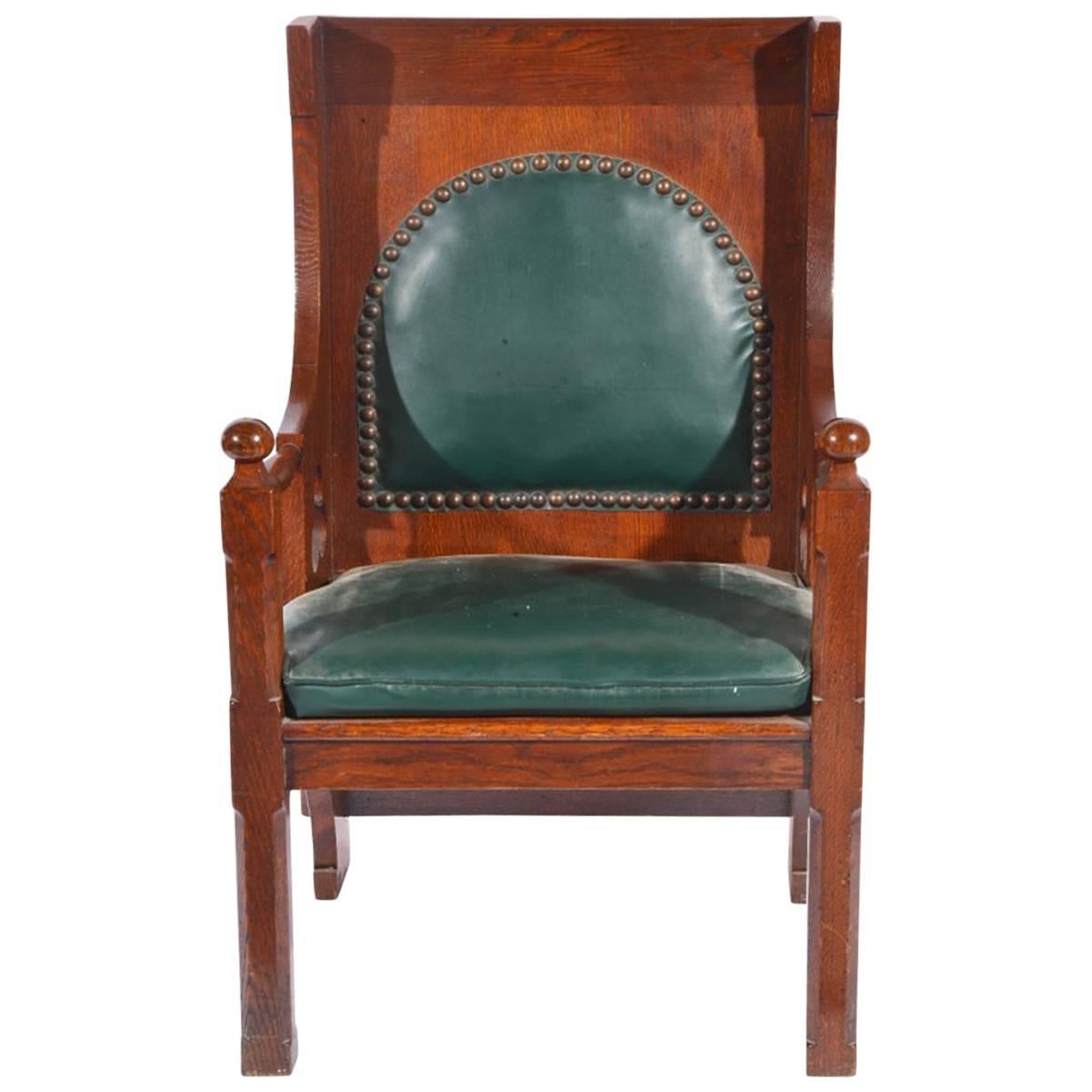 Liberty and Co. A Good Quality Arts and Crafts Oak Armchair.
