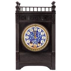 Antique English Aesthetic Movement Ebonized Wood and Pottery Mantle Clock