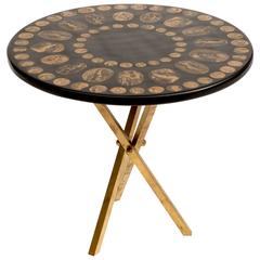 Fornasetti Side Table in Black and Gold with Roman Medallions