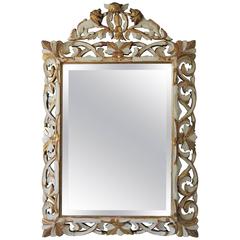 Late 19th Century Ornately Carved Giltwood and Painted Italian Mirror