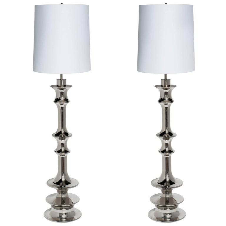 Pair of Hollywood Regency Sculptural Floor Lamps in Nickel For Sale
