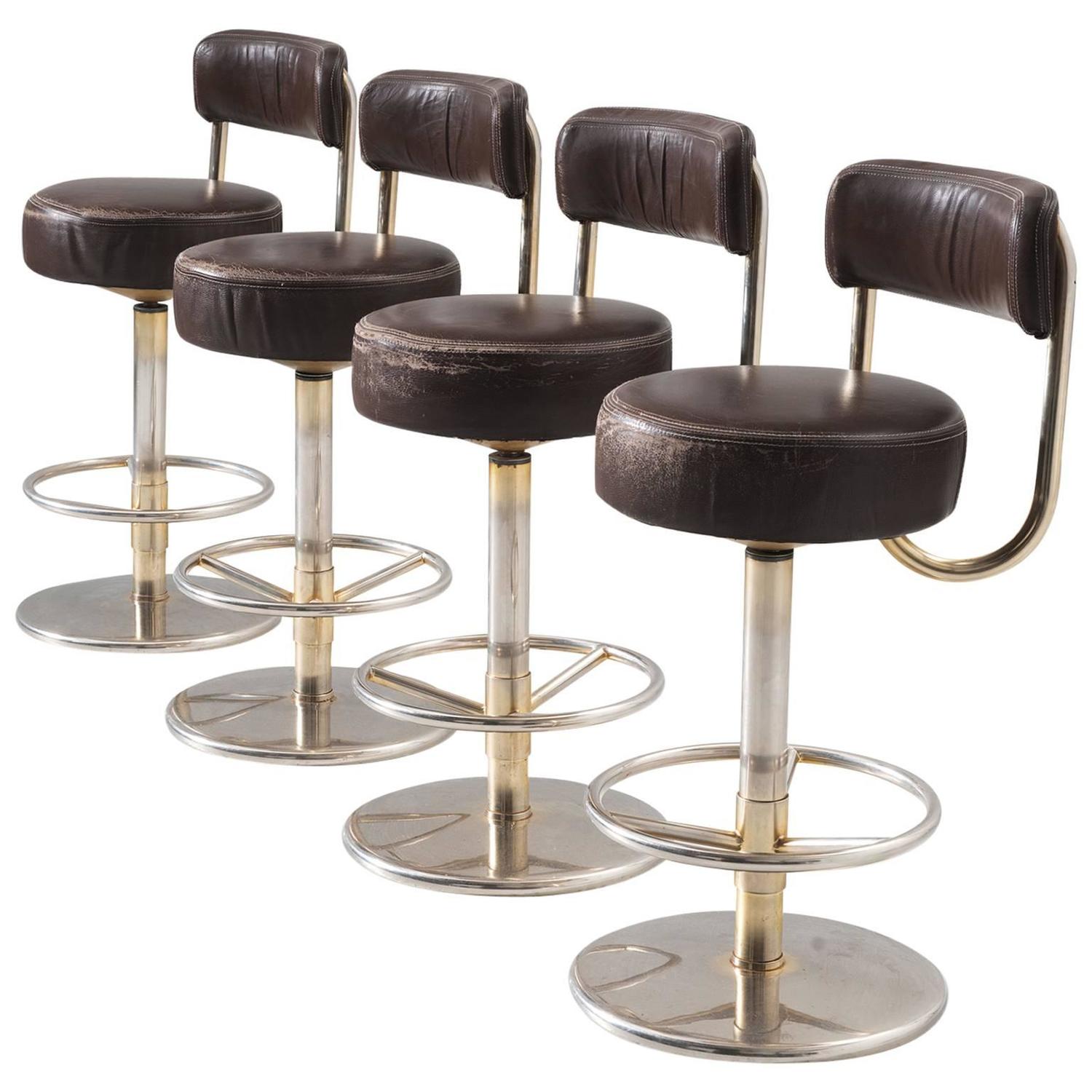 Set of Four Bar Stools in Brass Colored Metal and Brown Leather