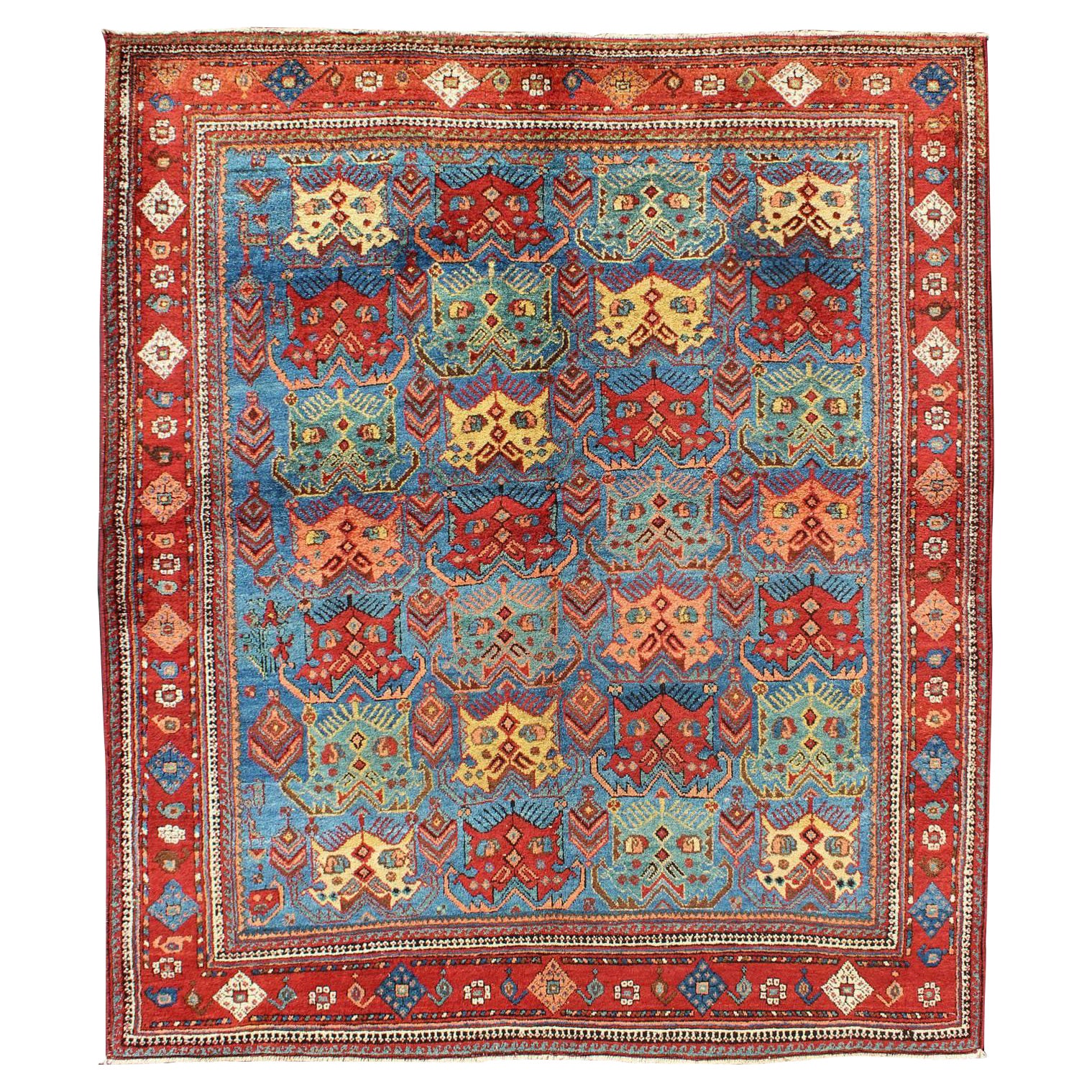 Antique Persian Afshar Rug in Blue Background, Terracotta Red Border & Lt. Green For Sale