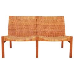 A mid-century design two-seat bench by Ejner Larsen & Aksel Bender Madsen 