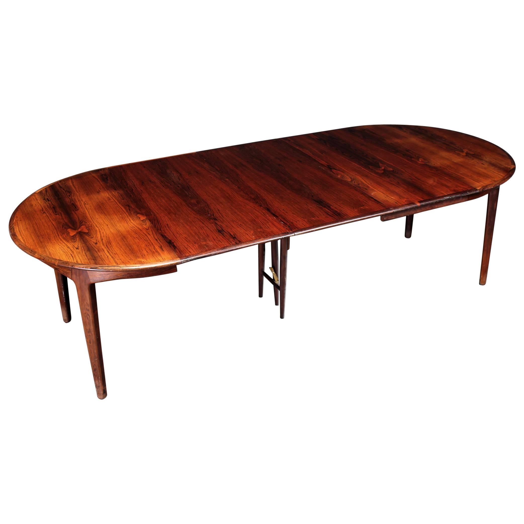 Danish Rosewood Dining Table by Henning Kjaernulf For Sale