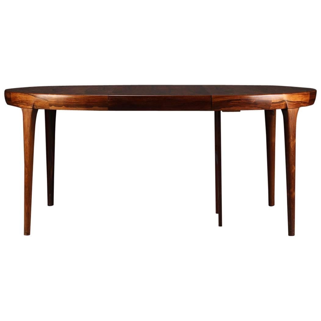 Danish Rosewood Dining Table by Faarup, Round Extending For Sale