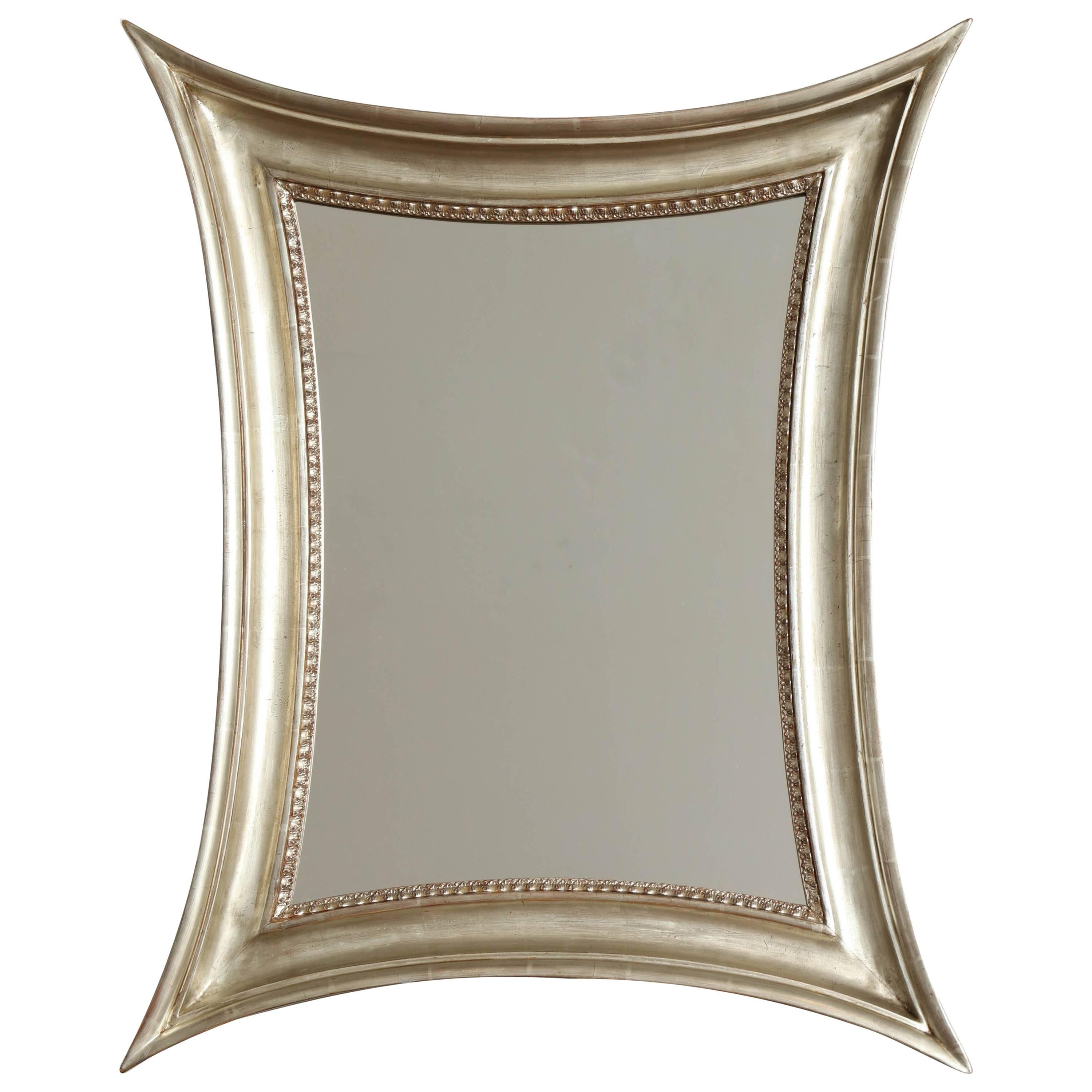 Miroir danois concave en bois doré argenté à côtés concaves