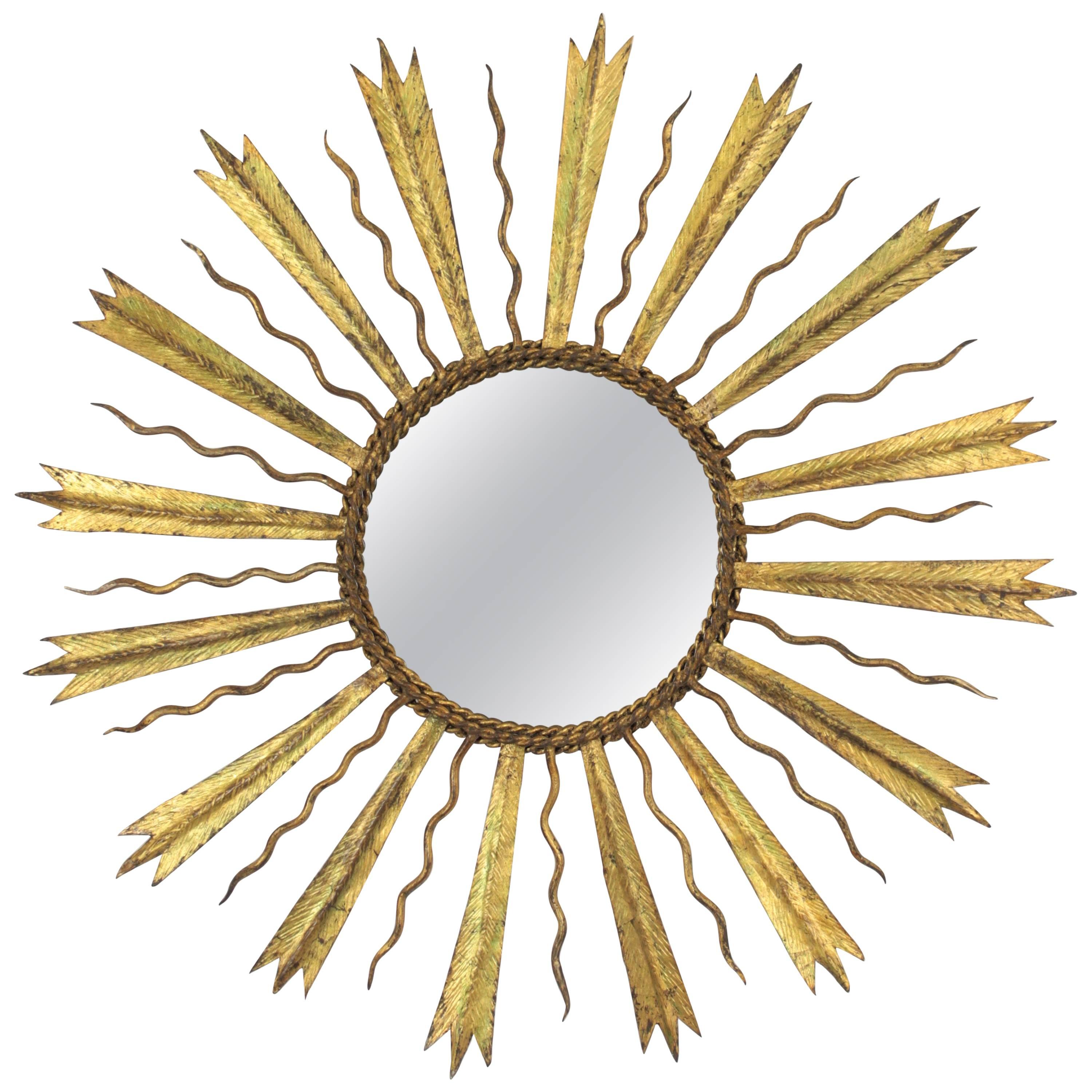 French Gilt Iron Sunburst Mirror in the Manner of Gilbert Poillerat