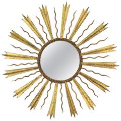 French Gilt Iron Sunburst Mirror in the Manner of Gilbert Poillerat