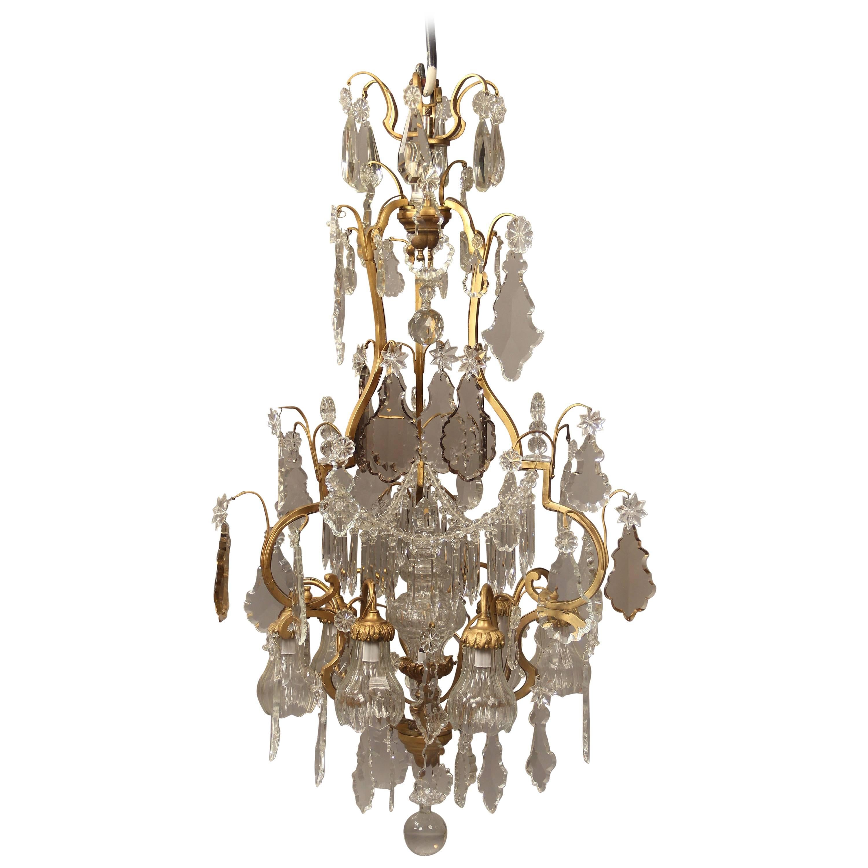 Nice Early 20th Century Gilt Bronze and Crystal Nine-Light Chandelier For Sale