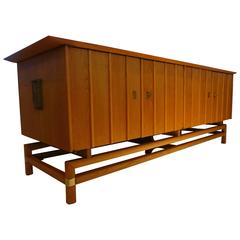 Striking 1950s, American, Mid-Century Large and Low Credenza With Brass Accents