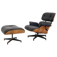 comme New Eames Lounge Chair and Ottoman:: Santo Palisander et cuir noir