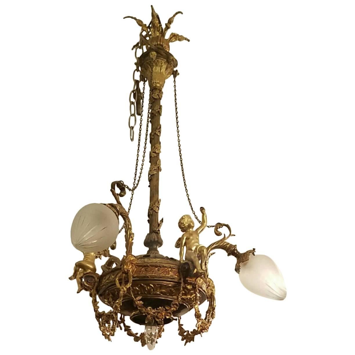 19th Century Gilt Bronze Four-Light Chandelier with Figures For Sale