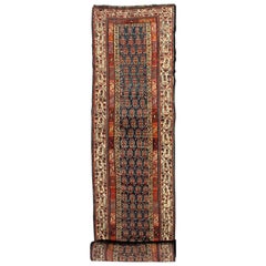 Long tapis de couloir persan ancien