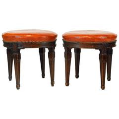 Pair of Late 18th Century Italian Carved Walnut Stools with Leather Cover