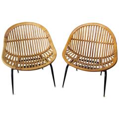 Vintage Pair of Mid-Century Modern Rattan Wicker Basket Chairs by Troy Sunshade Company