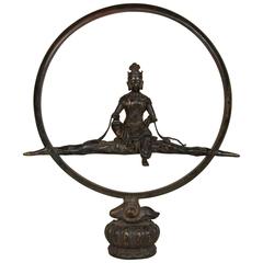 Japanese Bronze of the Goddess Kannon Seated on Clouds in a Zen Circle