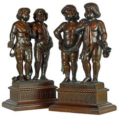 Group of 19th Century Baroque Style Putti Figures Holding Swags and Flowers Group of 19th Century Baroque Style Putti Figures Holding Swags and Flowers