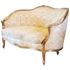 Louis XV Style Loveseat in a fine Gilt Wood Frame