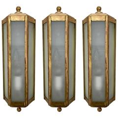 Set of Three Matching Brass Wall Sconces Set of Three Matching Brass Wall Sconces