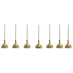 Set of Seven Scandinavian Mid-Century Pendant Lights in Brass, 1960s