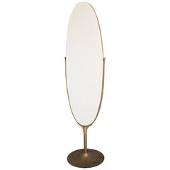Oval Dressing Mirror with a Brass Frame