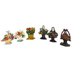 Group of Five Early 20th Century Painted Cast Iron Doorstops