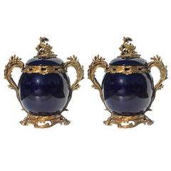 Pair of Baroque Style Bronze-Mounted Royal Blue Porcelain Potpourri Urns