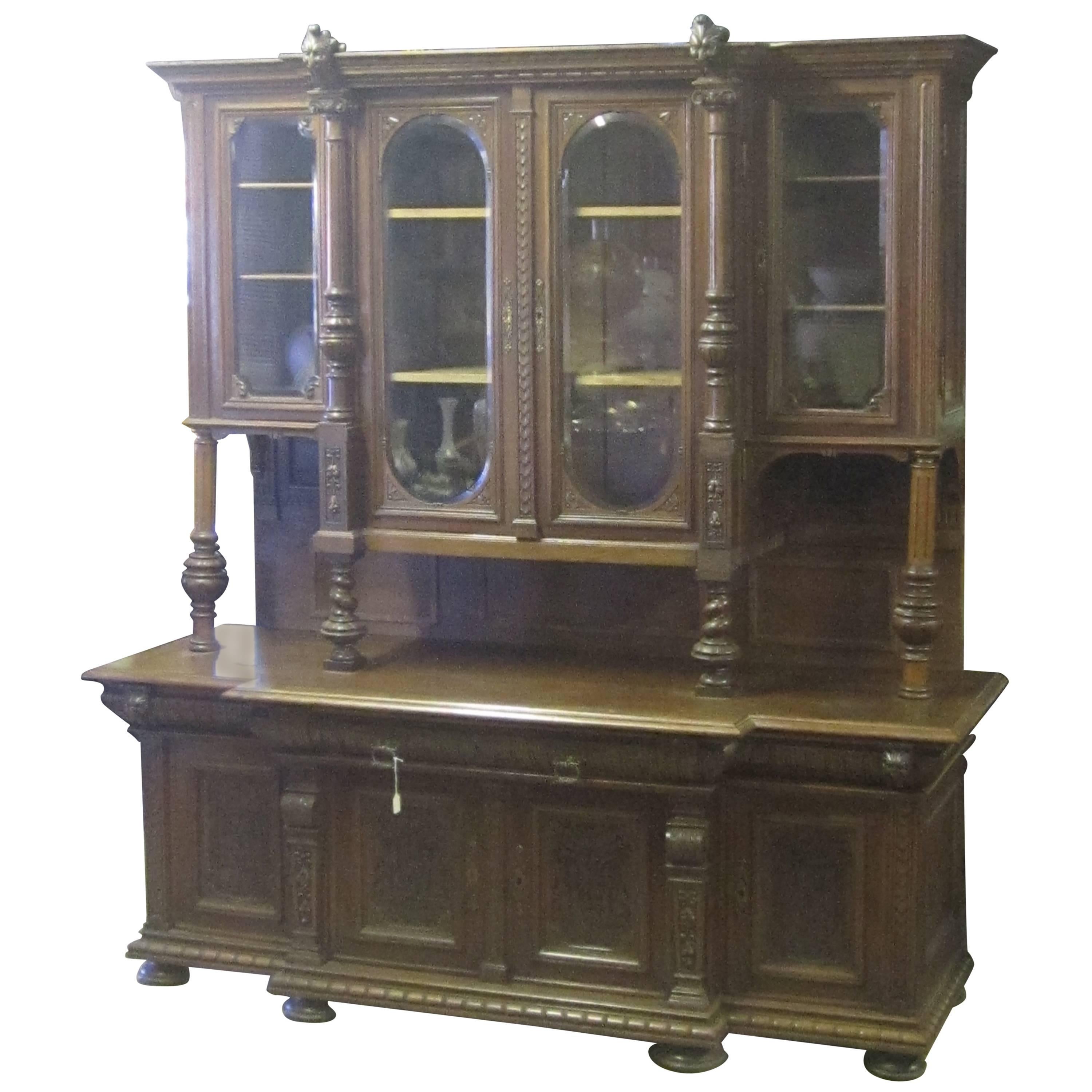 19th Century European Carved Walnut Breakfront with Burled Detail For Sale