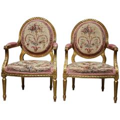 Pair of French 19th Century Giltwood Open Armchairs in the Louis XVI Style