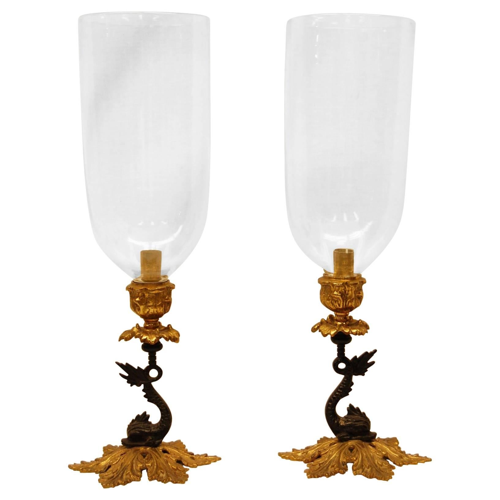 Pair of Reproduction Brass Candlesticks with Glass Hurricanes on Dolphin Bases