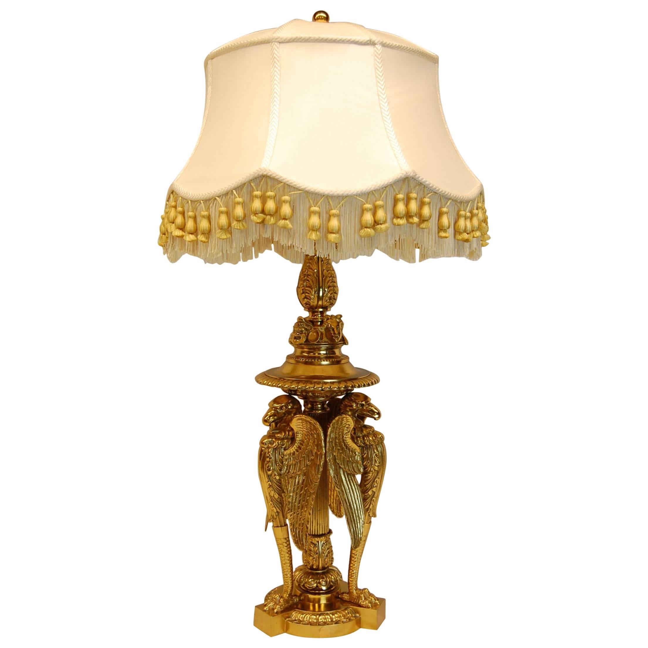 Large Gilt Brass Table Lamp Featuring Three Large Eagles For Sale