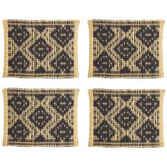 Set of Four Wicker Placemats with Black Decorations