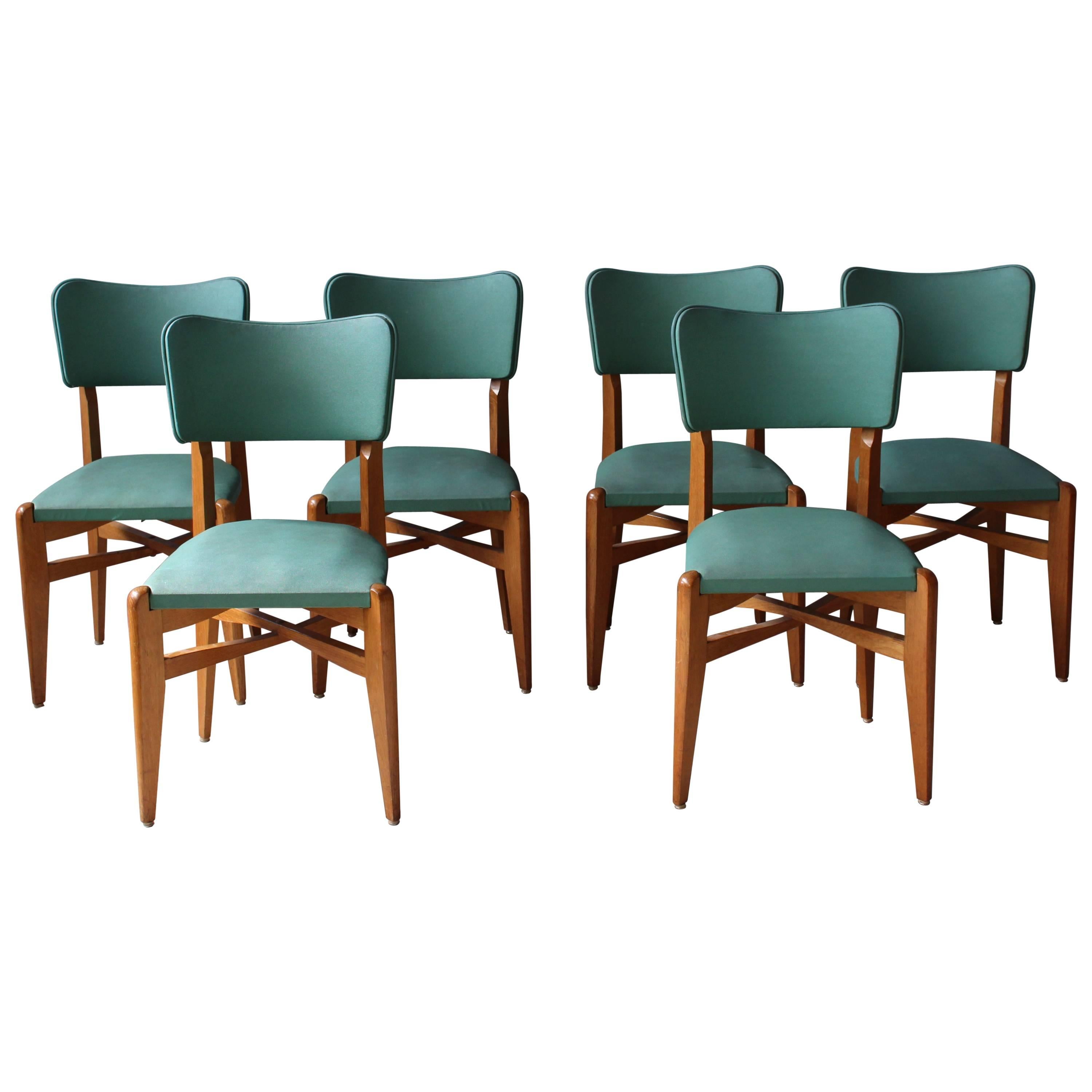 A set of 6 French 1950's Oak Chairs