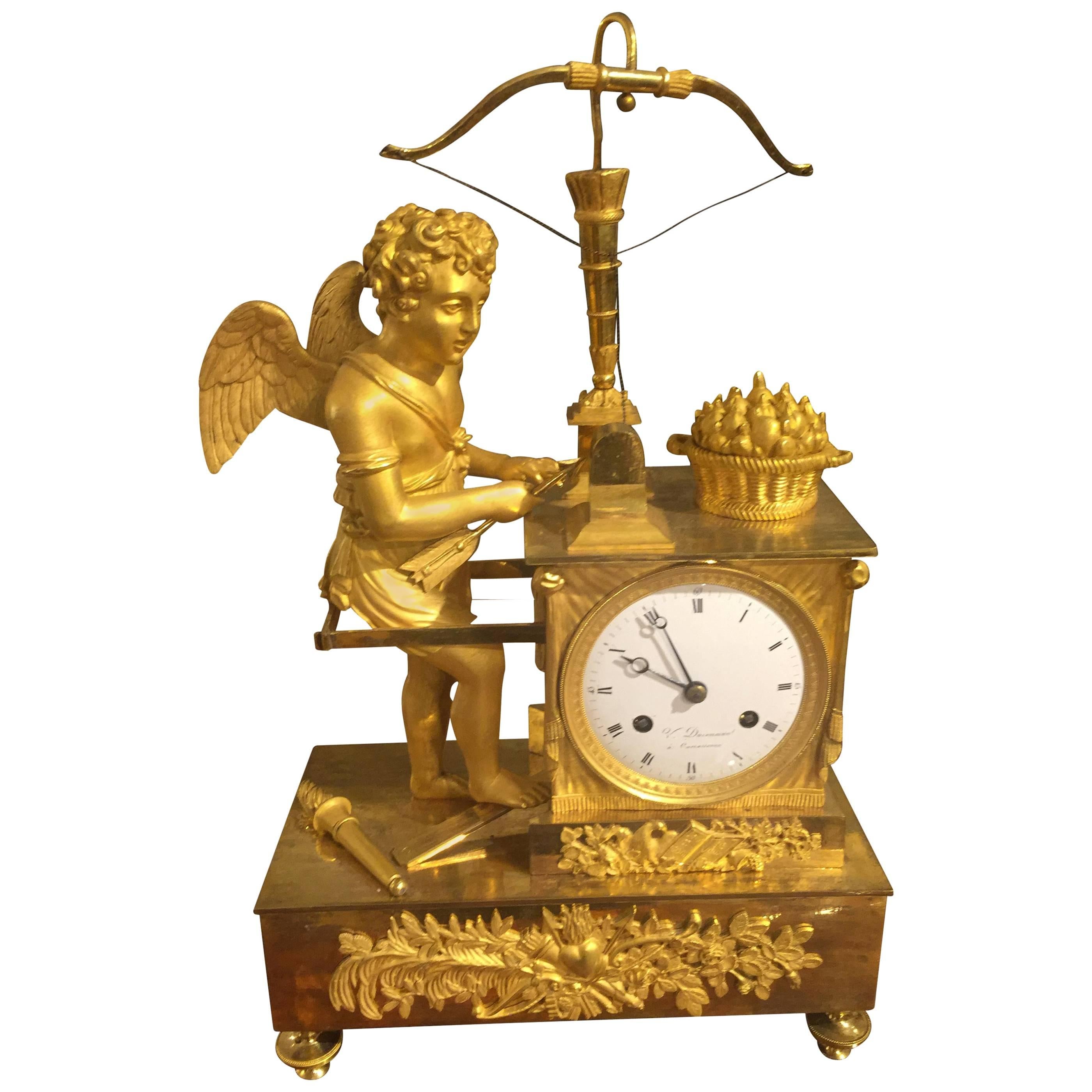 French Bronze Mantel Clock, circa 1805, Amor Grinds the Arrowhead For Sale