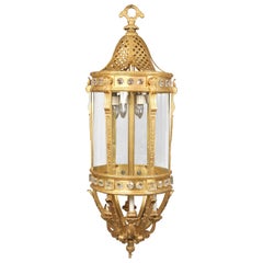 Monumental farol de doce luces de bronce dorado y cristal de finales del siglo XIX