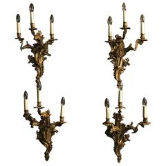 French Set of Four Gilded Antique Wall Sconces