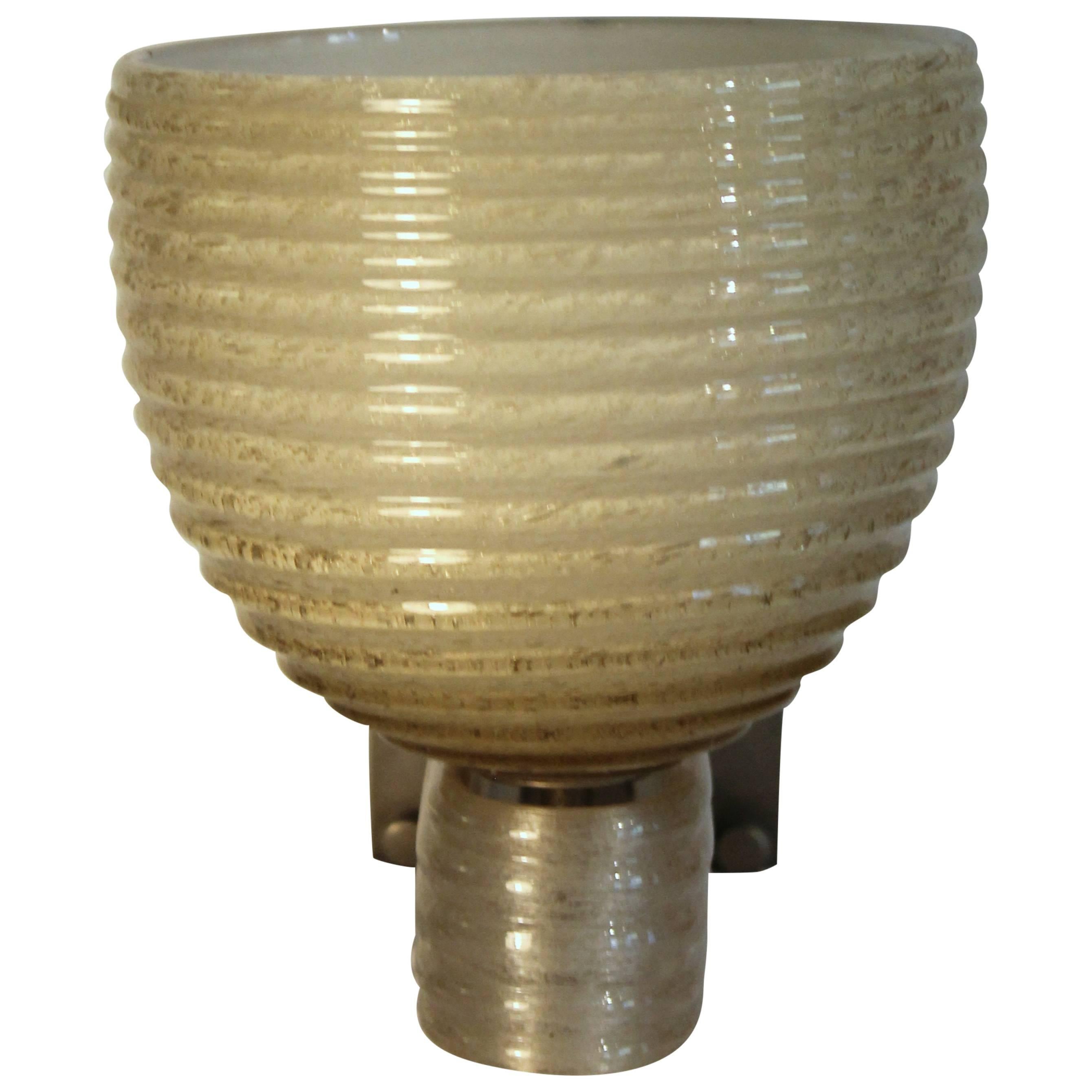Single Venini sconce with bubble glass cup and support, wall bracket nickel-plated metal, dated 1923-1925.

Designed by Tomaso Buzzi.

References:

Tomaso Buzzi alla Venini, Skira catalogue 2014
Cambi auction 262 lot. n°332