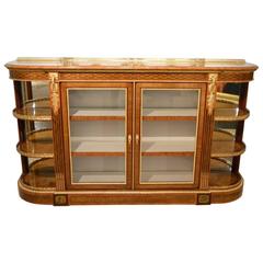 An Exhibition quality sycamore, purple heart and kingwood ormolu mounted Victor