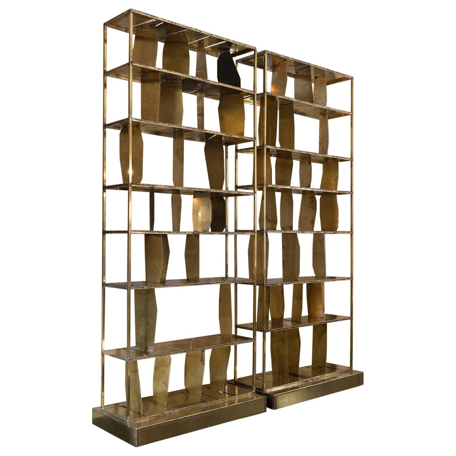 Brass Bookcase, Brutalist style with brut cuts and welded seams, part of the flair edition and crafted by local artisans in natural brass with no varnishing, this gives the piece a vintage patina that is the main characteristic of the collection,