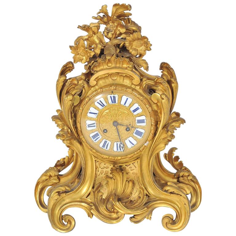 19th Century French GoldPlated Mantel Clock with Carved Wooden Gold