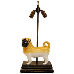 20th Century Porcelain Figure of a Pug Dog Resting on a Modern Wooden Base