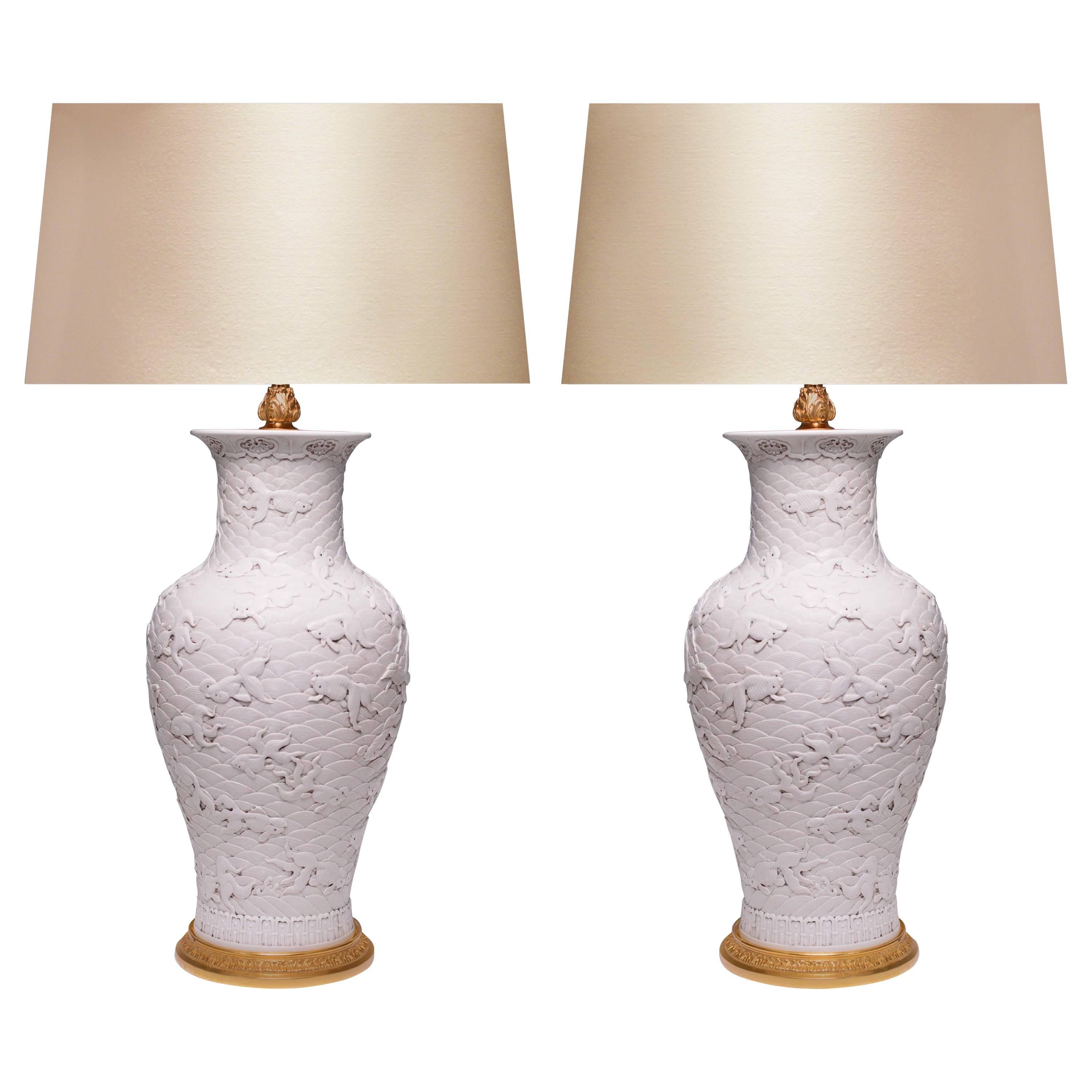 Pair of Fine Carved White Porcelain Lamps For Sale