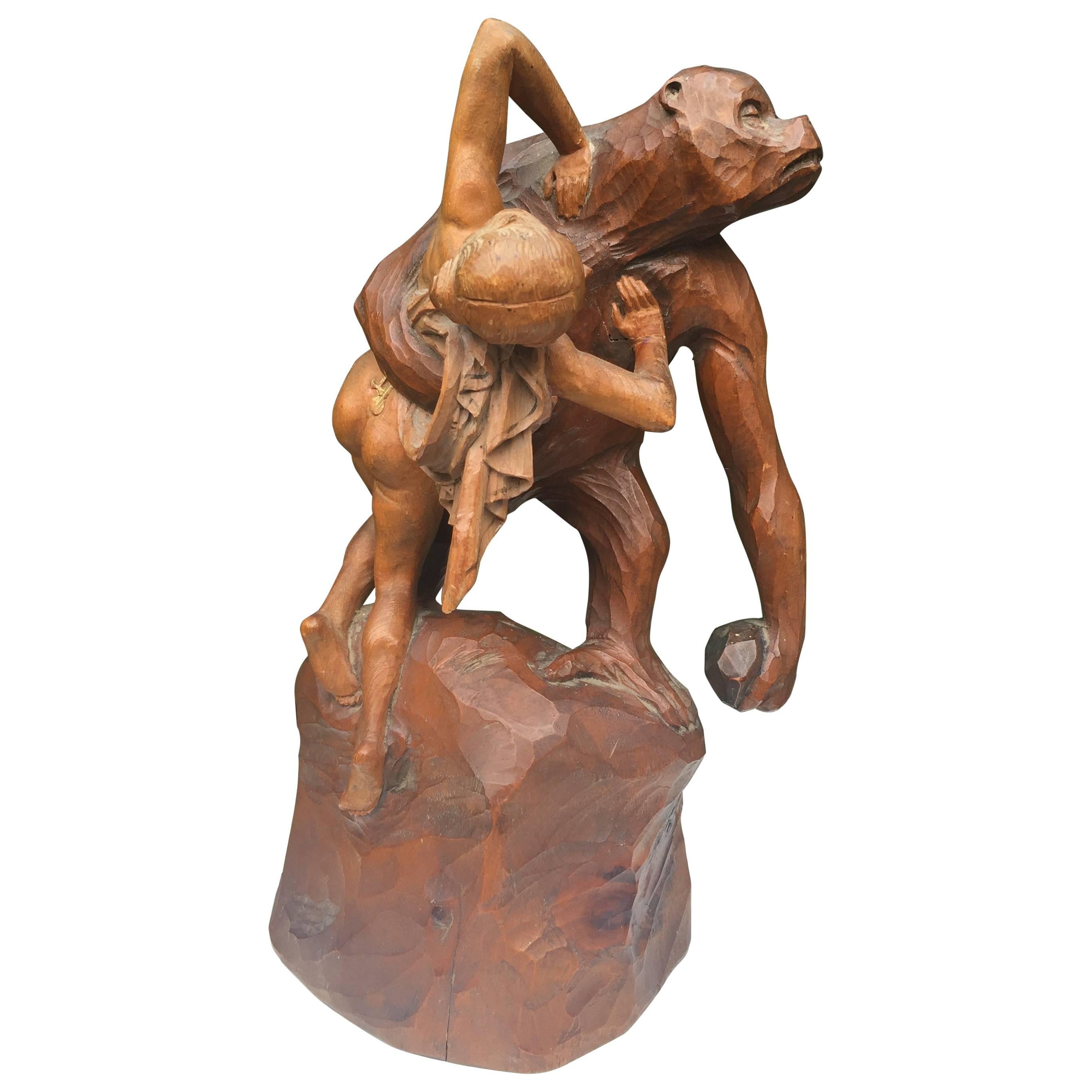 Early 1900 Gorilla Carrying off a Woman Crafted in Wood after Emmanuel Fremiet For Sale