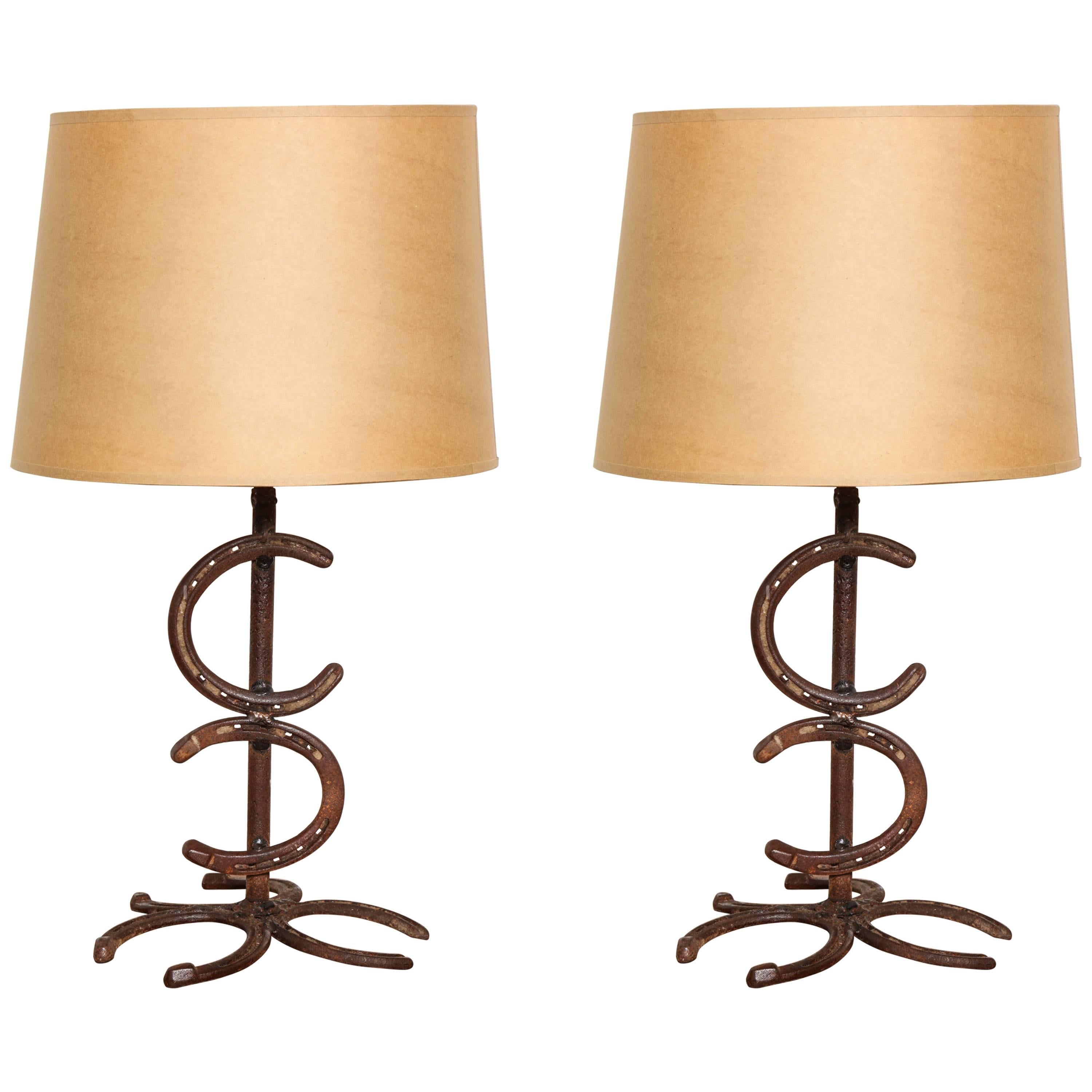 Pair of Hand-Forged Horseshoe Lamps For Sale