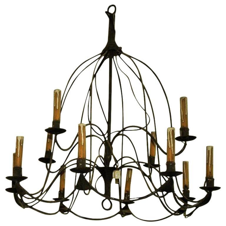 Country French Iron Twelve-Light Chandelier For Sale