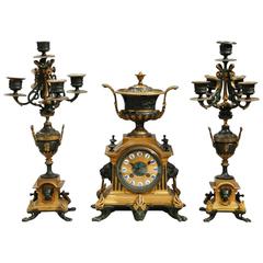 19th Century, French Bronze Clock Garniture Set with an Urn and a Lion Motif 3